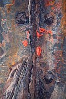 Skulptur Schrott Pfahl Gesicht